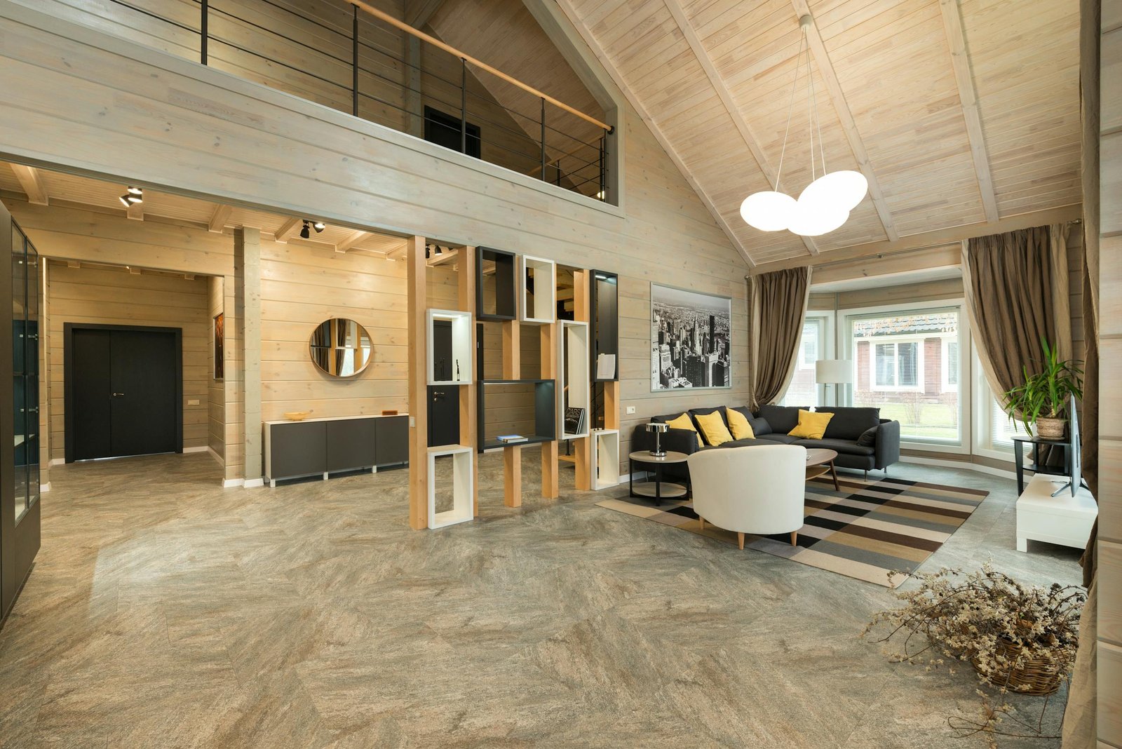 Elegant modern living room with wooden interiors, stylish furniture, and ample natural light.